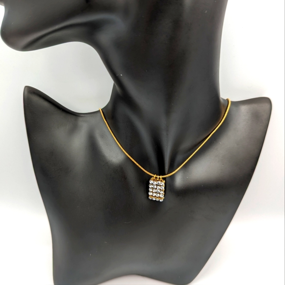 Vintage Swarovski crystals pendants signed on a gold tone Authentic